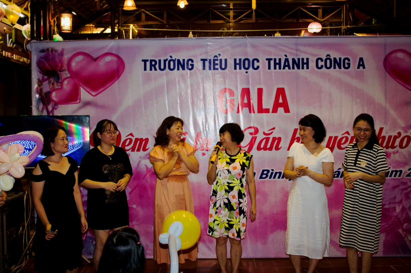 A group of women on a stage

Description automatically generated with medium confidence