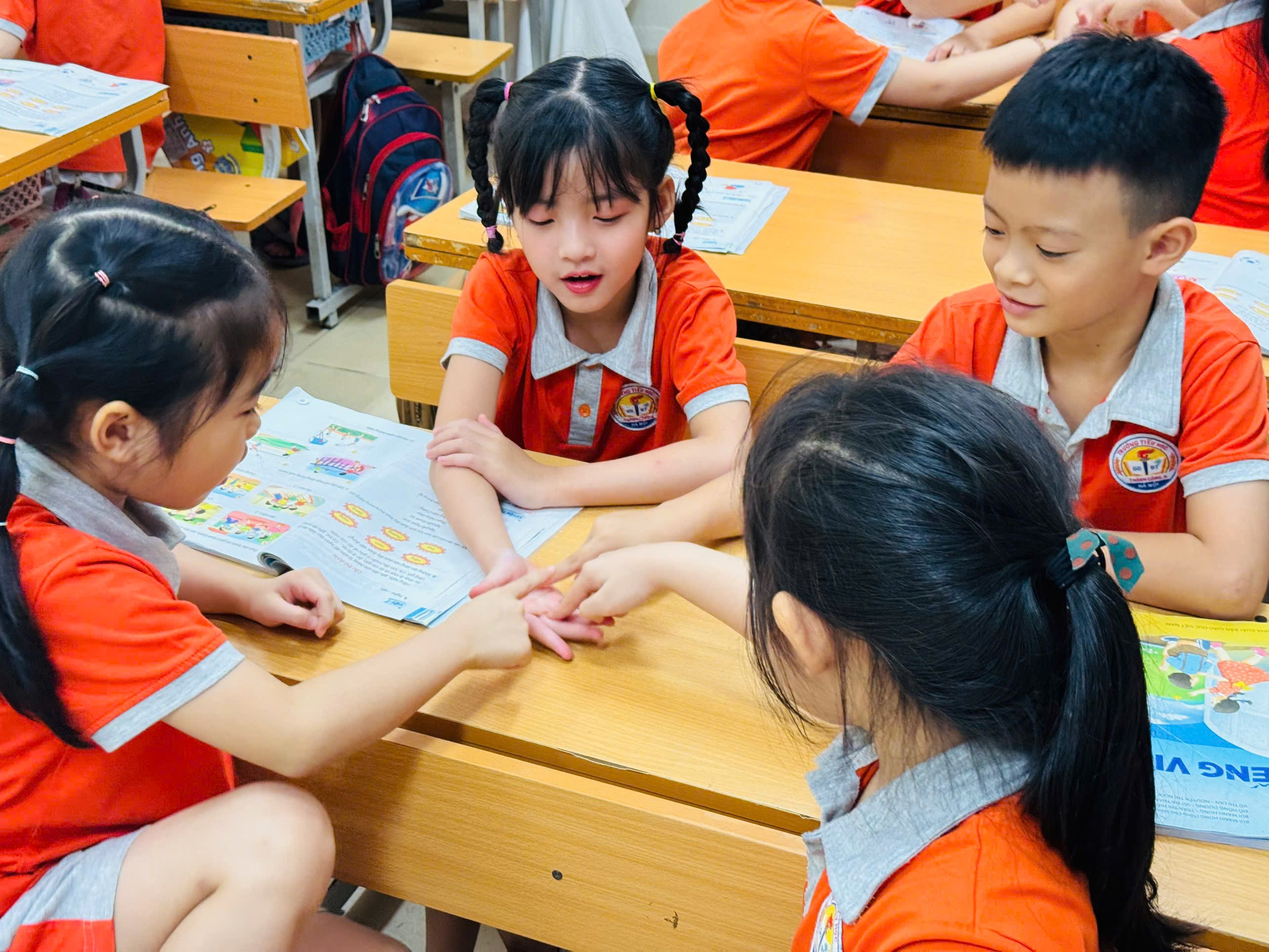 A group of children in a classroom
AI-generated content may be incorrect.