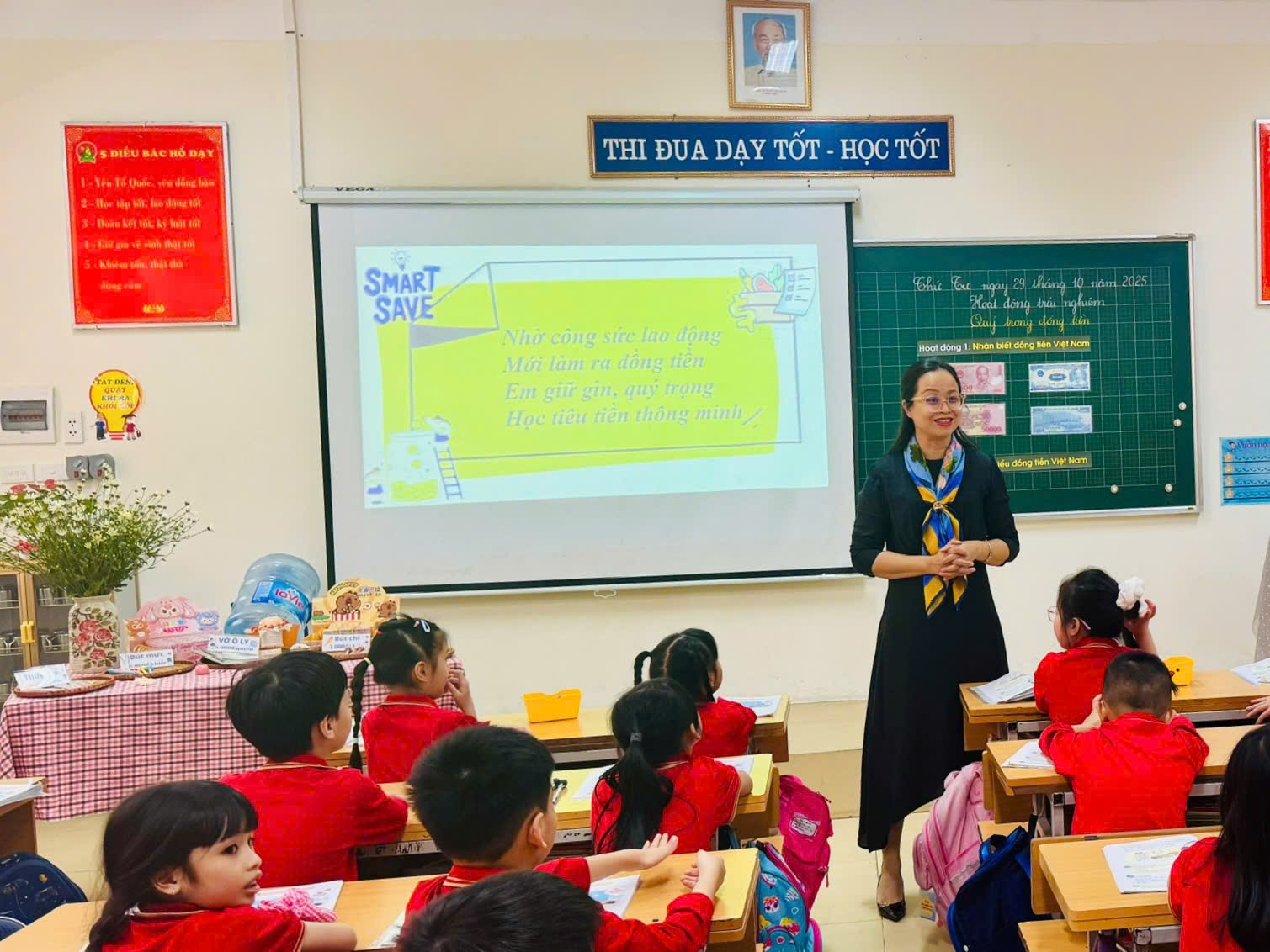 A person standing in front of a classroom with a white board
AI-generated content may be incorrect.