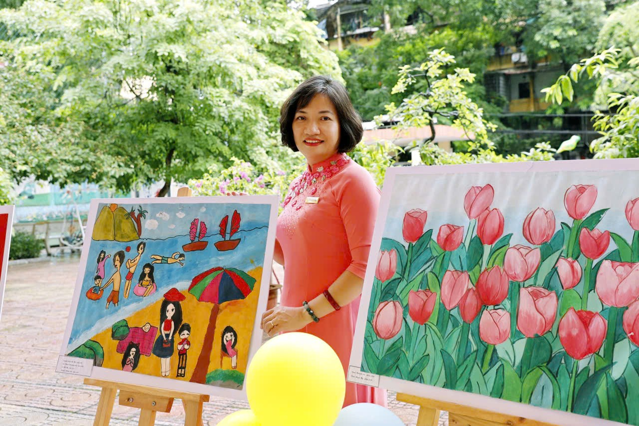 A person standing next to paintings
AI-generated content may be incorrect.