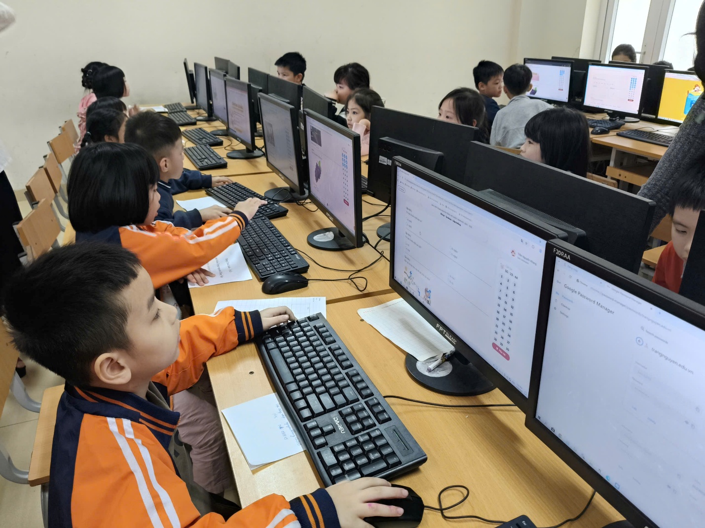 A group of children using computers
AI-generated content may be incorrect.