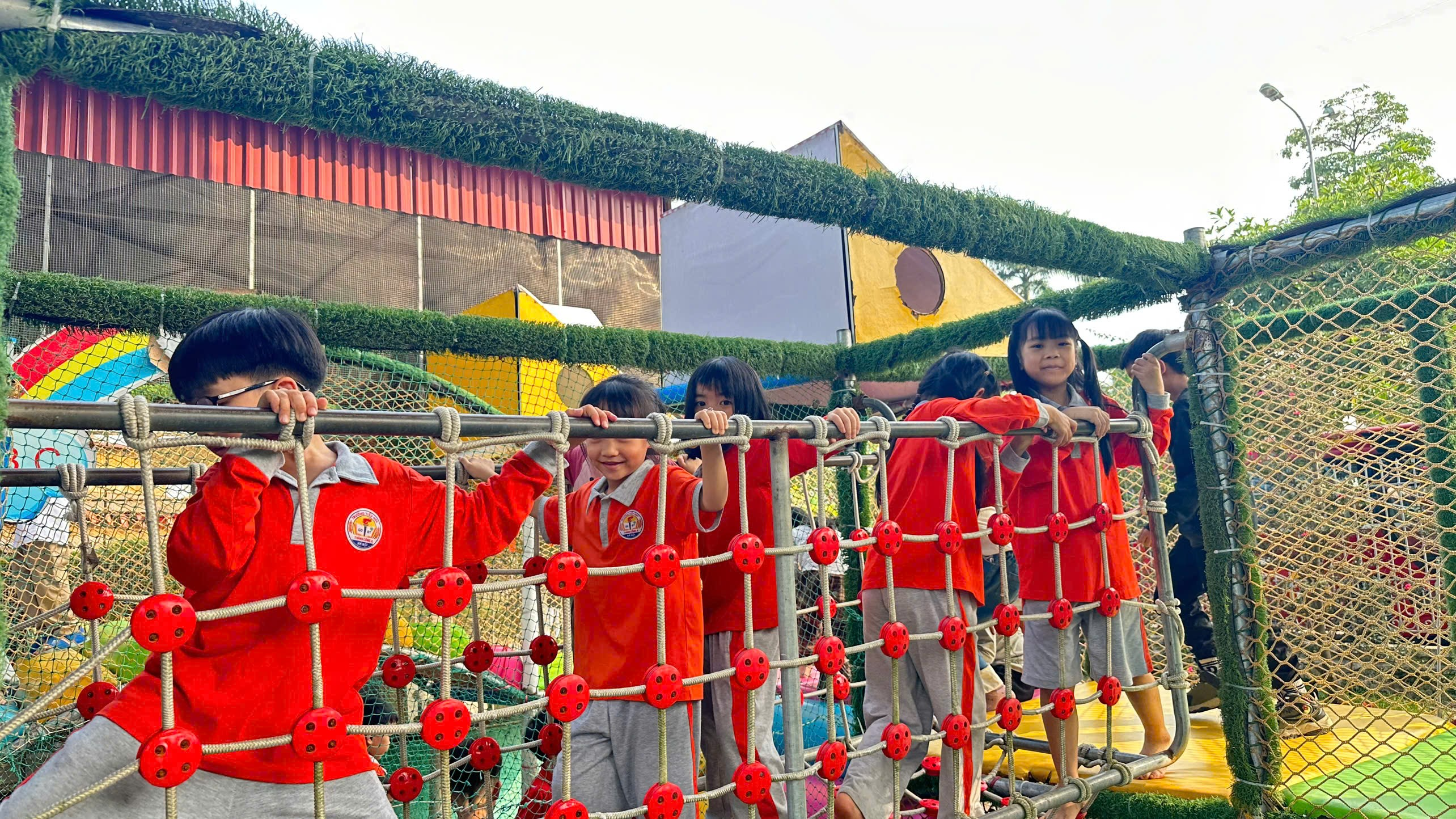 A group of children playing on a playground
AI-generated content may be incorrect.