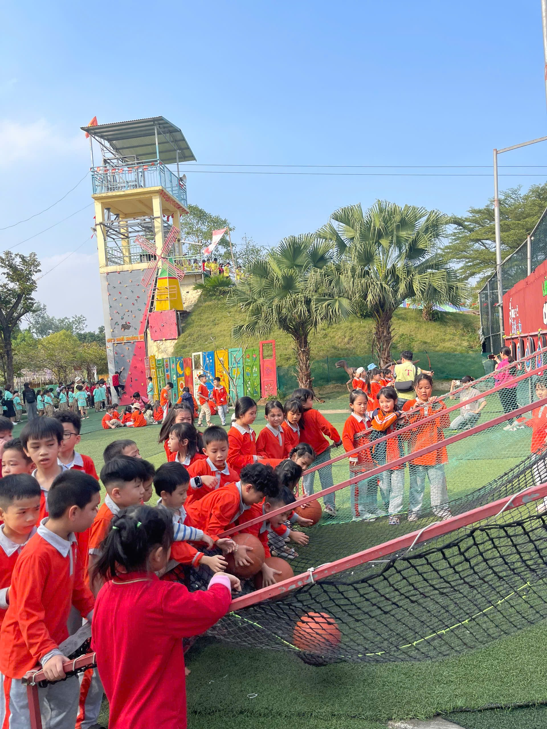 A group of children in red uniforms
AI-generated content may be incorrect.