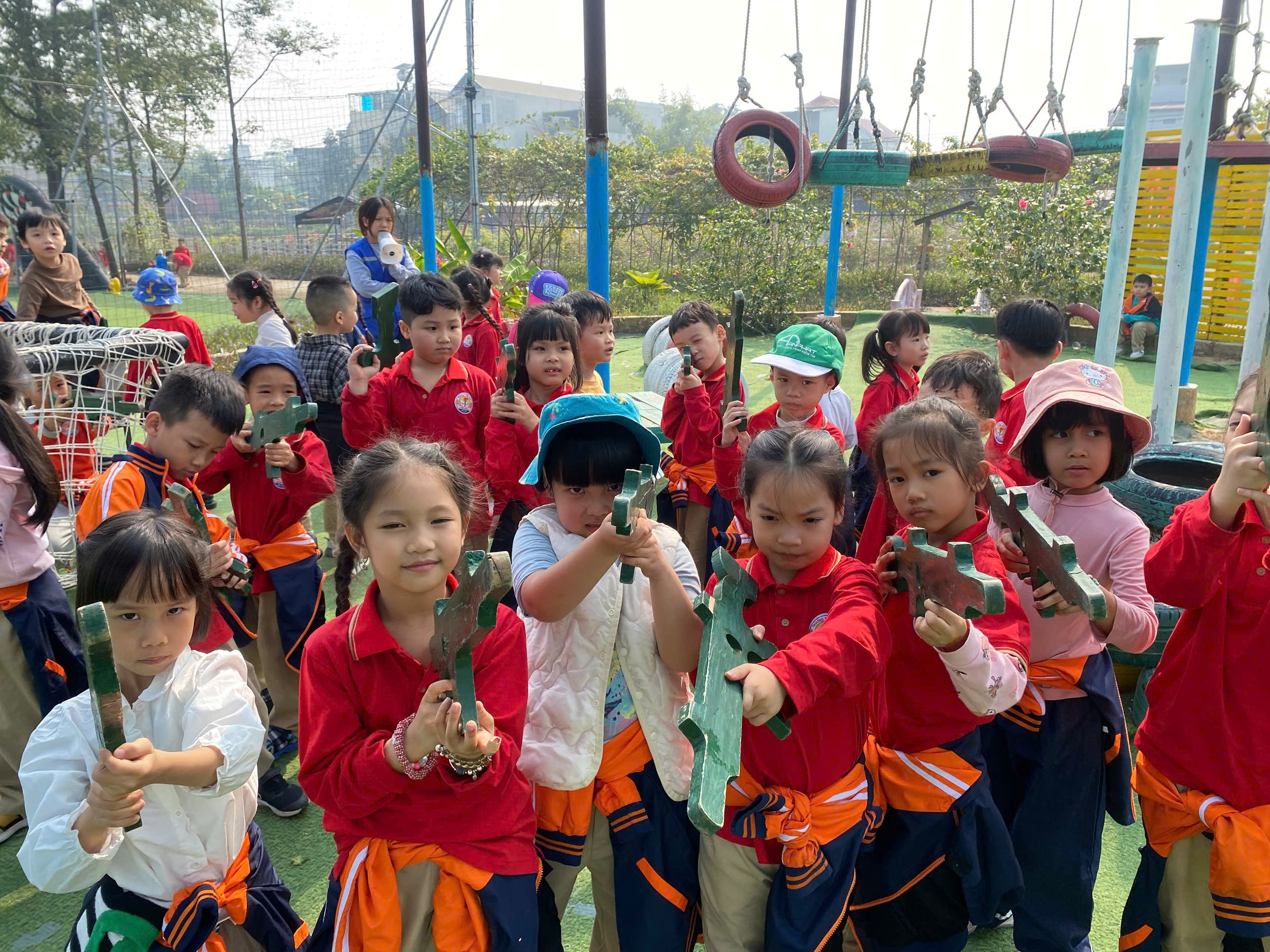 A group of children holding toy guns
AI-generated content may be incorrect.