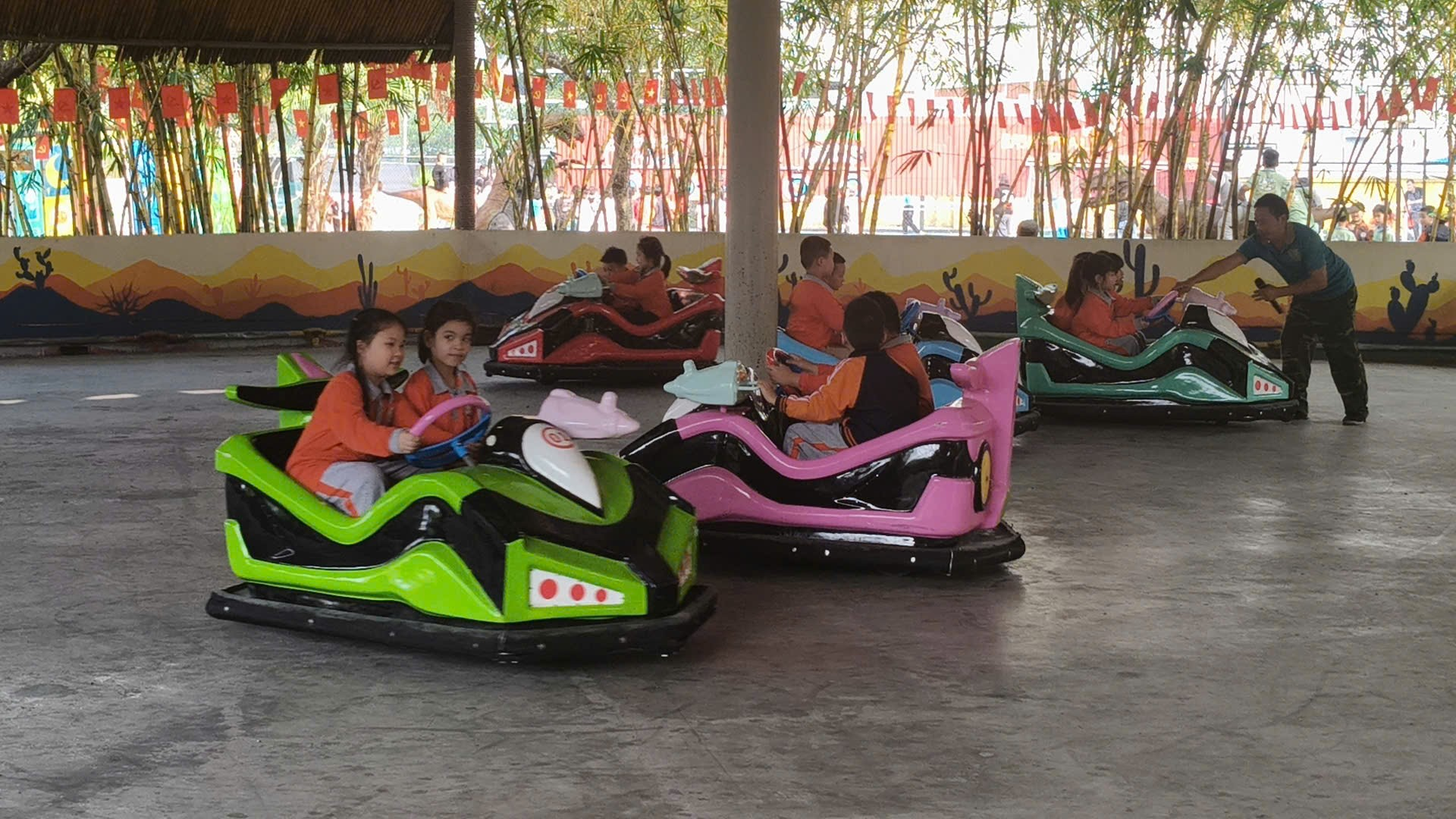 A group of people on bumper cars
AI-generated content may be incorrect.