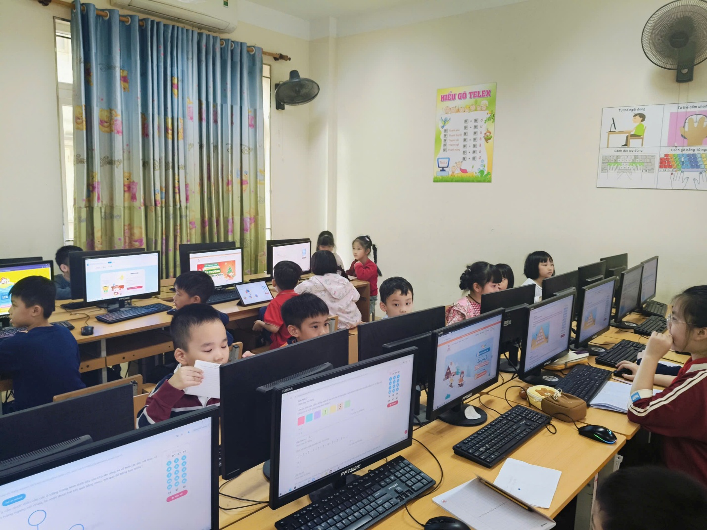 A group of children in a classroom with computers

AI-generated content may be incorrect.
