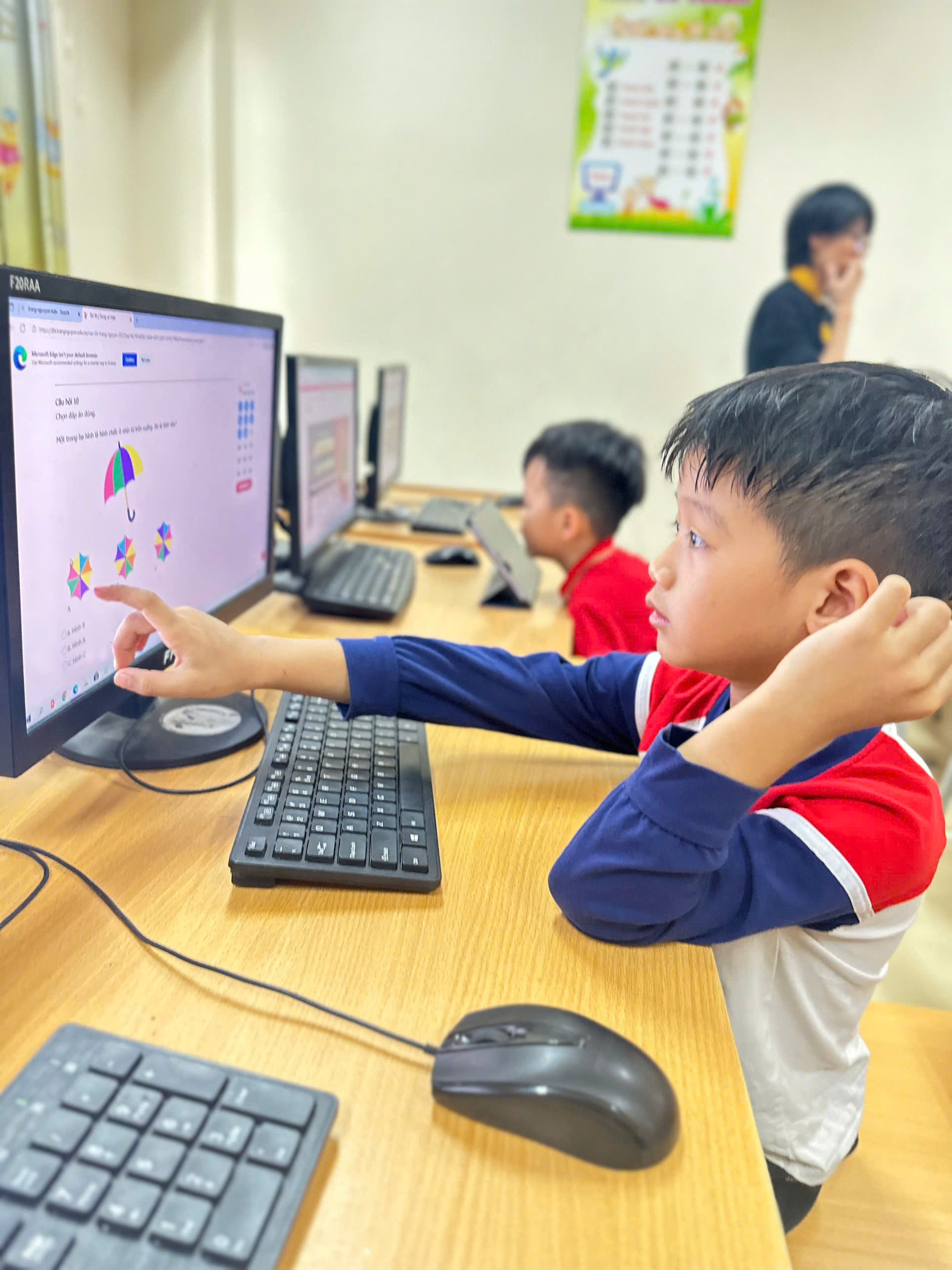 A child pointing at a computer screen

AI-generated content may be incorrect.