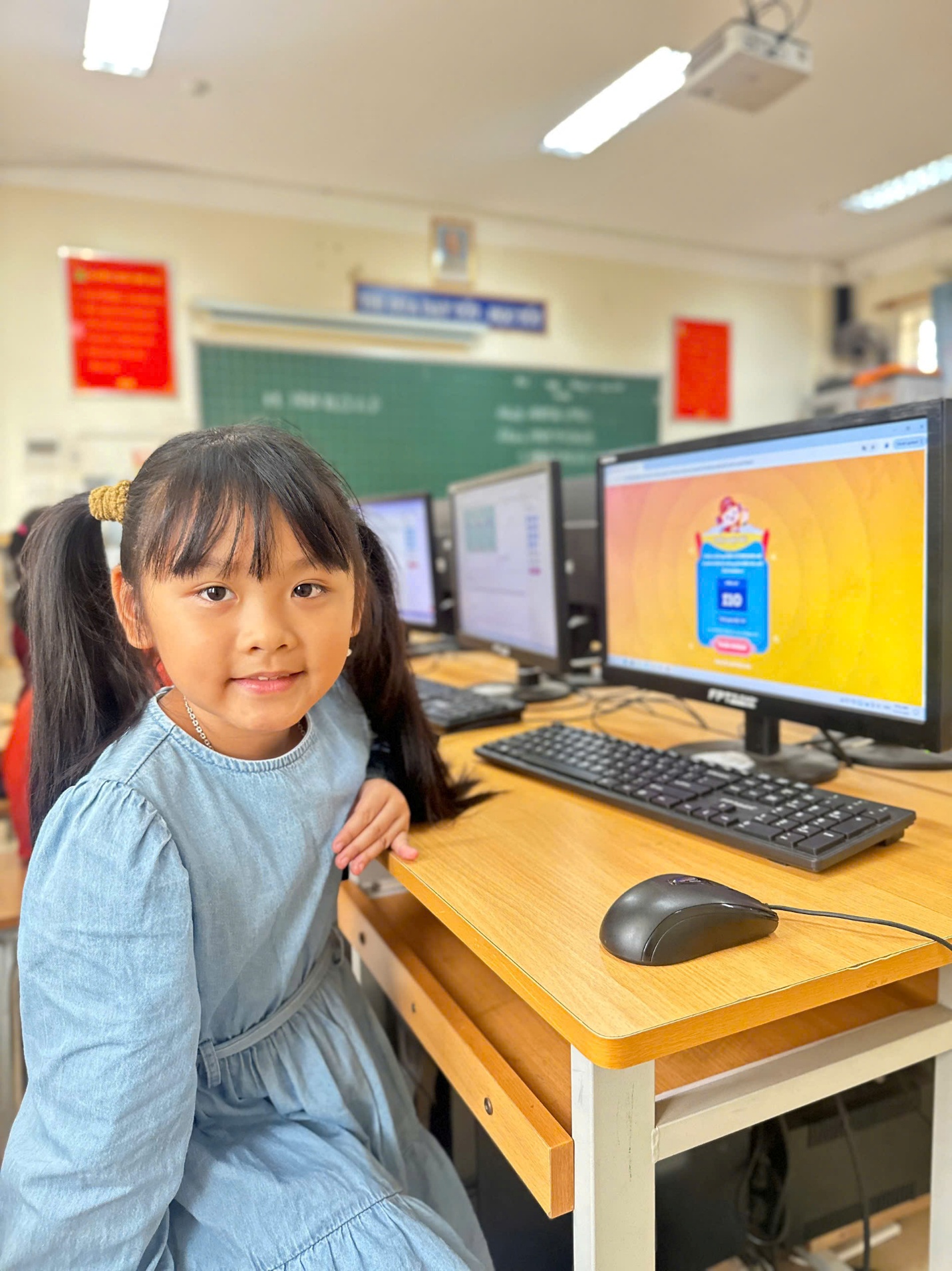A child sitting at a desk with a computer

AI-generated content may be incorrect.