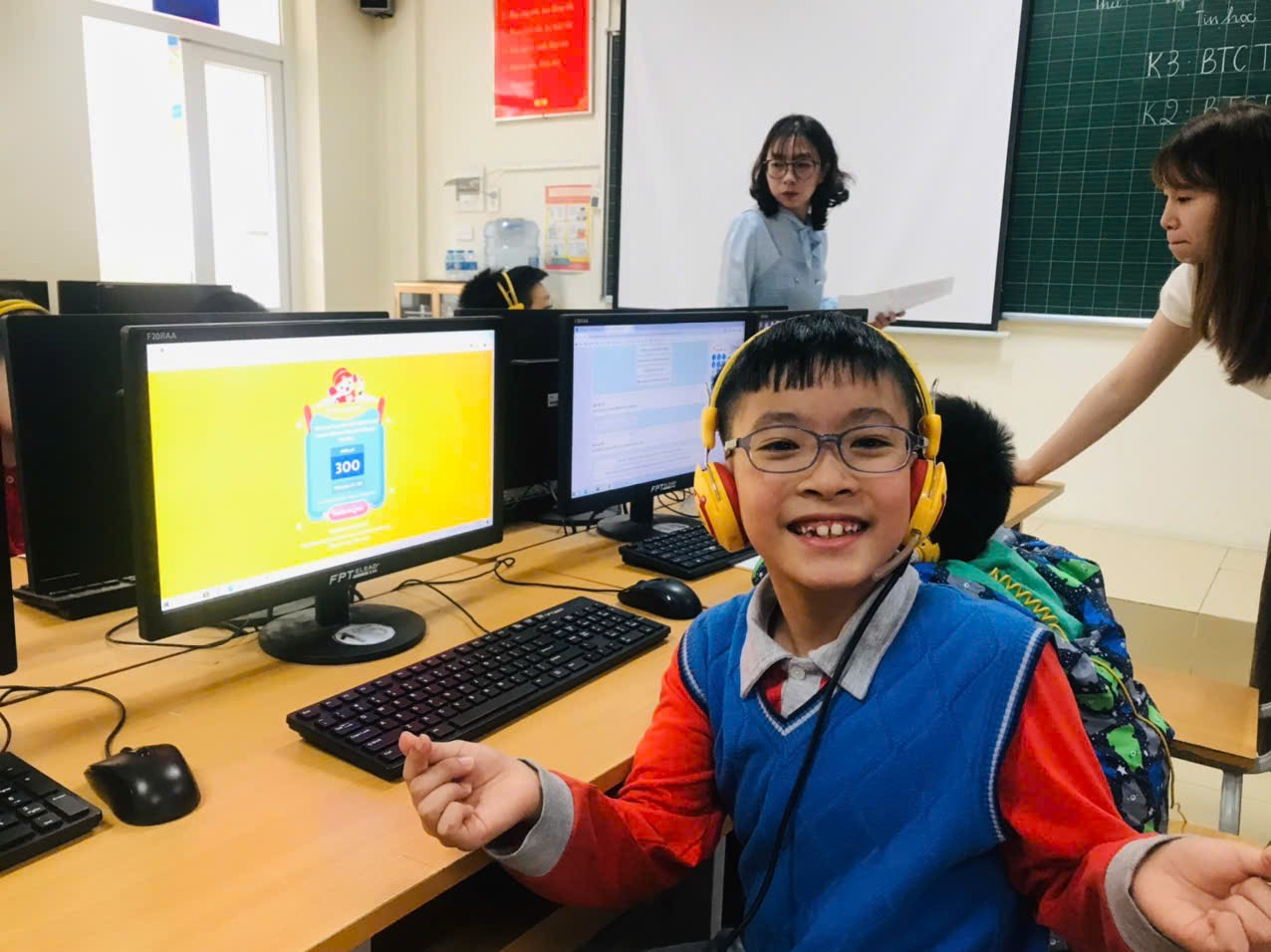 A child wearing headphones and smiling at camera

AI-generated content may be incorrect.