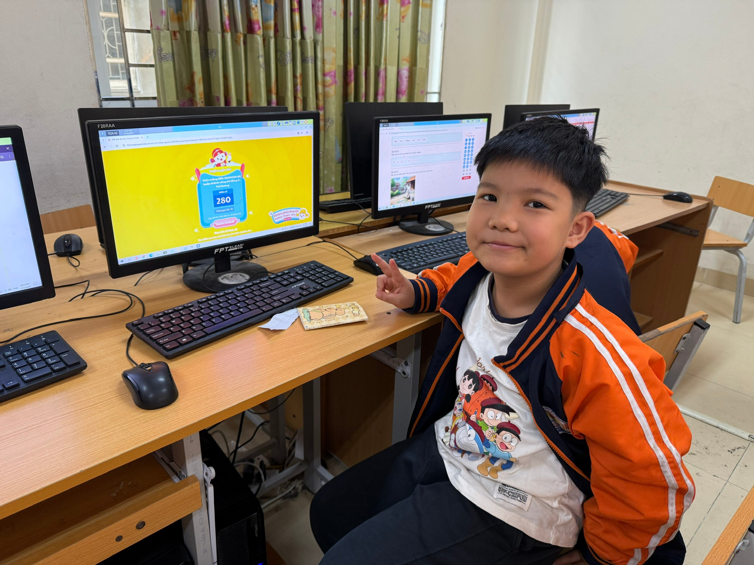 A child sitting at a desk with a computer and a keyboard

AI-generated content may be incorrect.
