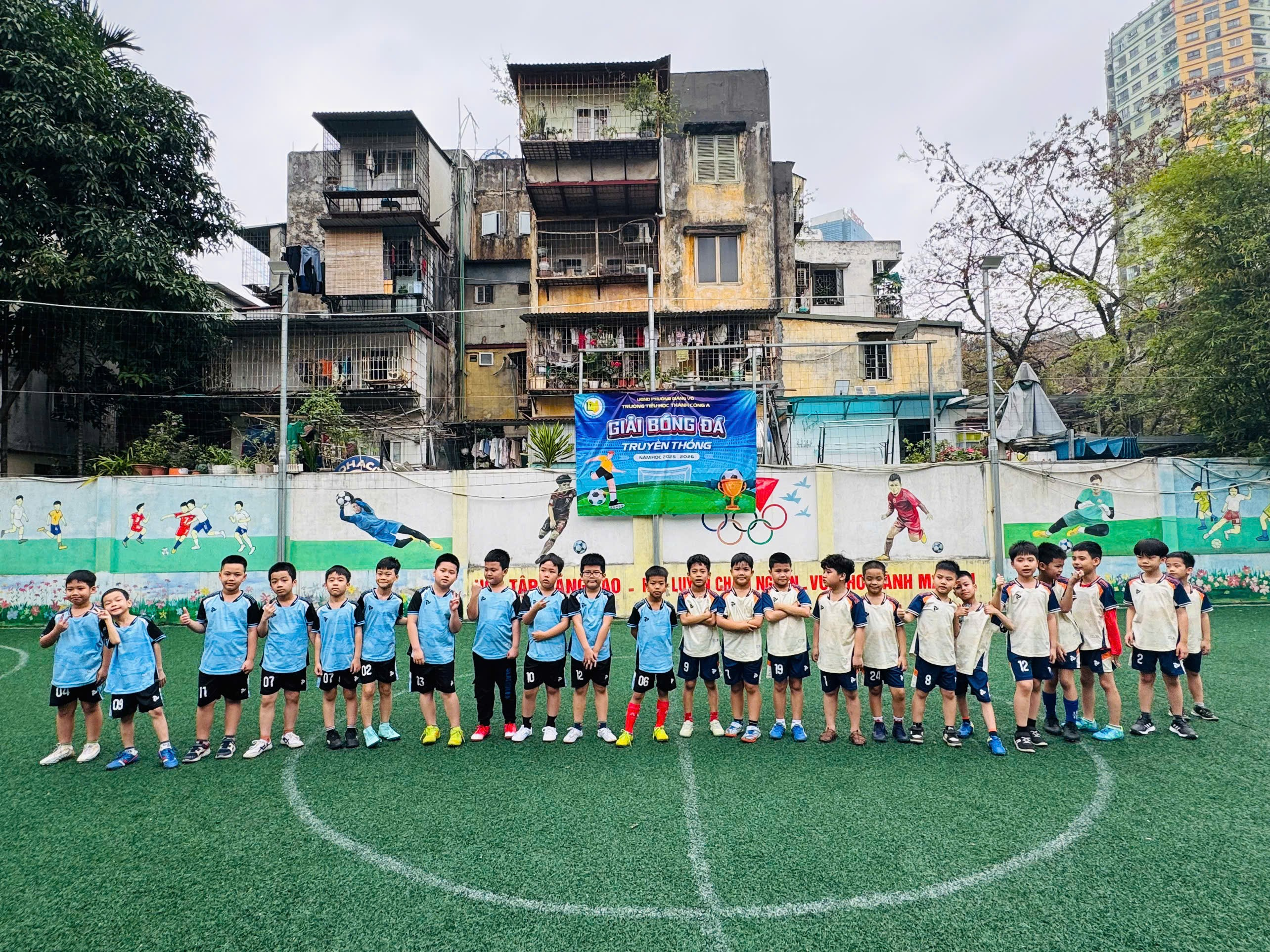 A group of boys in blue uniforms on a football field

AI-generated content may be incorrect.
