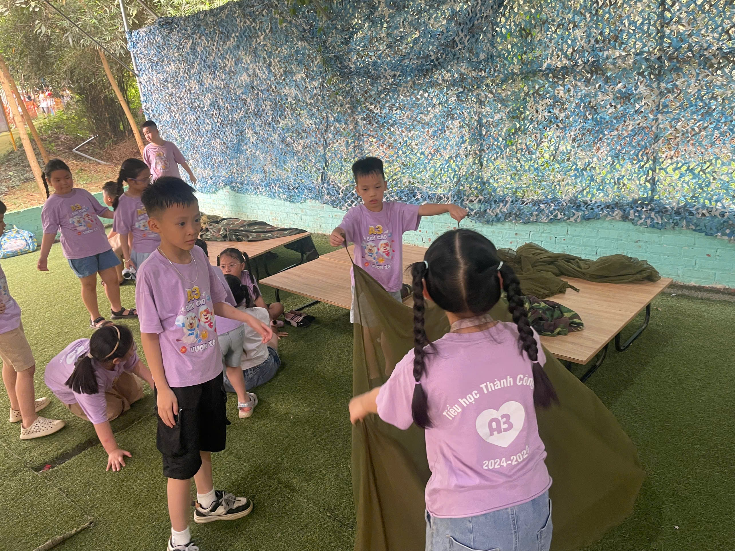 A group of children in matching shirts

AI-generated content may be incorrect.