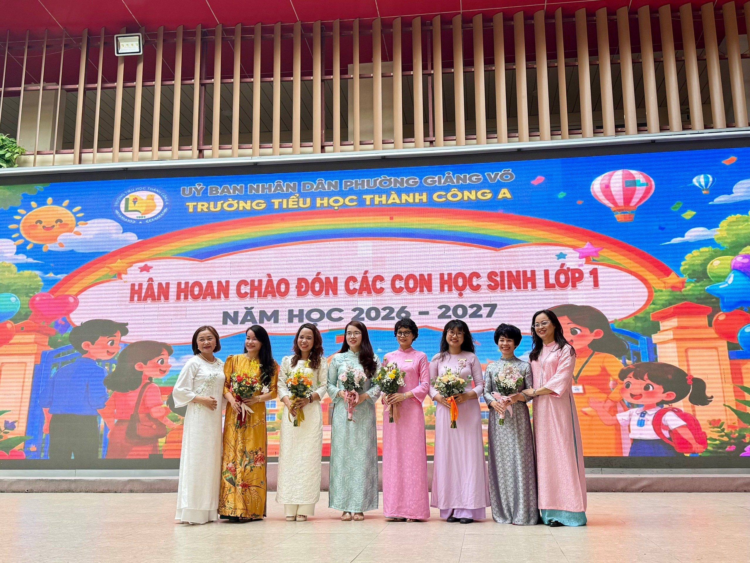 A group of women in long dresses posing for a photo
AI-generated content may be incorrect.