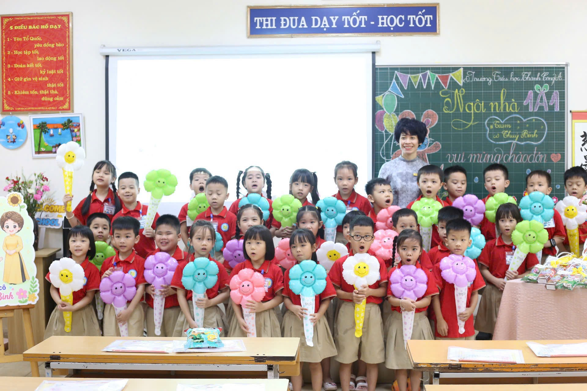 A group of children holding balloons
AI-generated content may be incorrect.